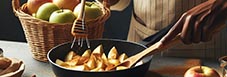 Una persona cocinando manzanas